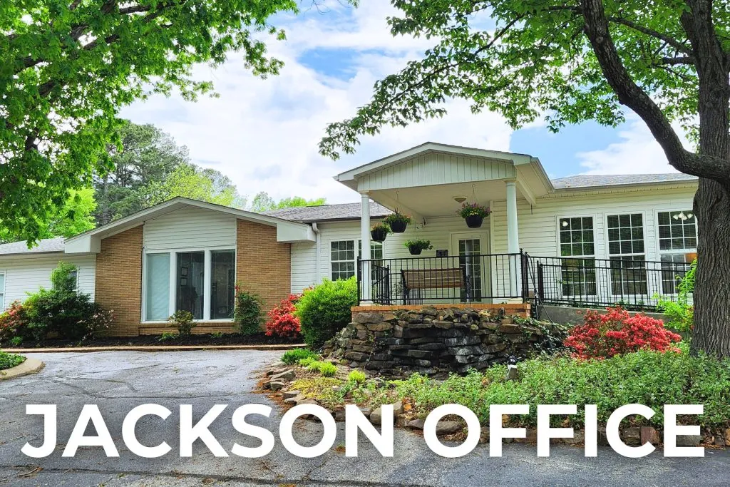 Jackson office building with stone planter and trees