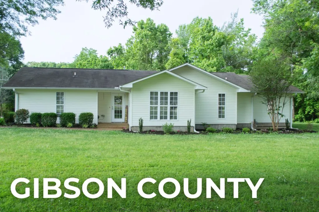 Single-story white house with lawn, Gibson County